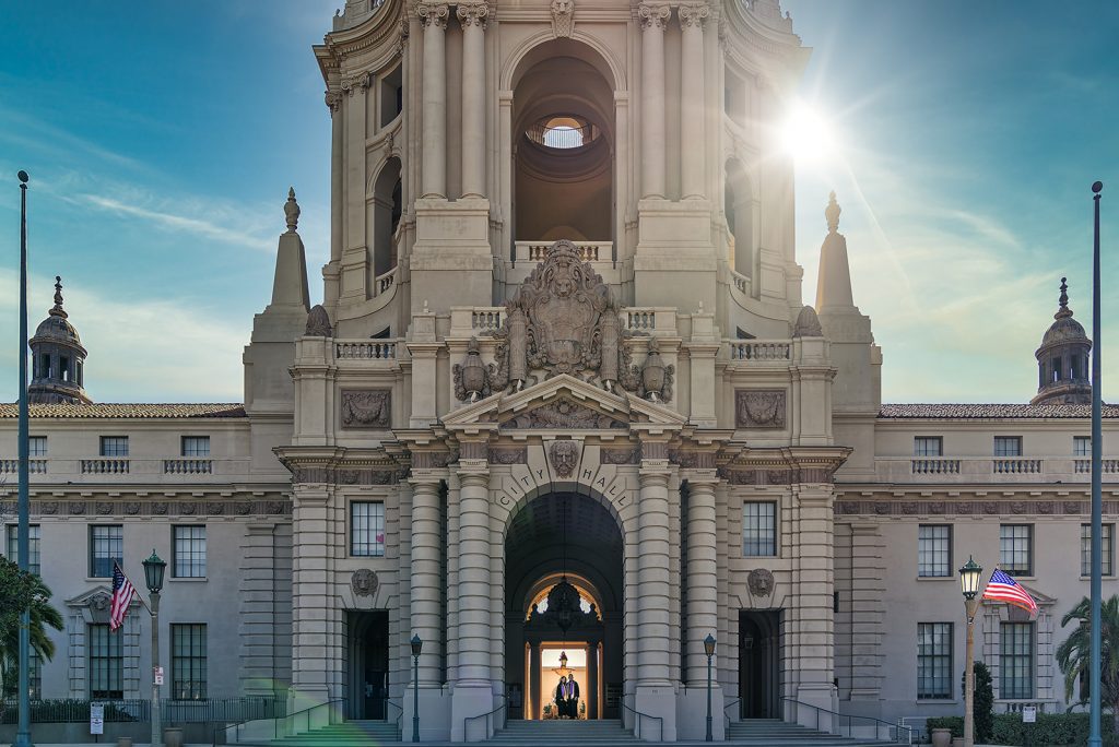 A photographer named Thomas Kim captures the essence of a large building with a clock tower in Los Angeles.