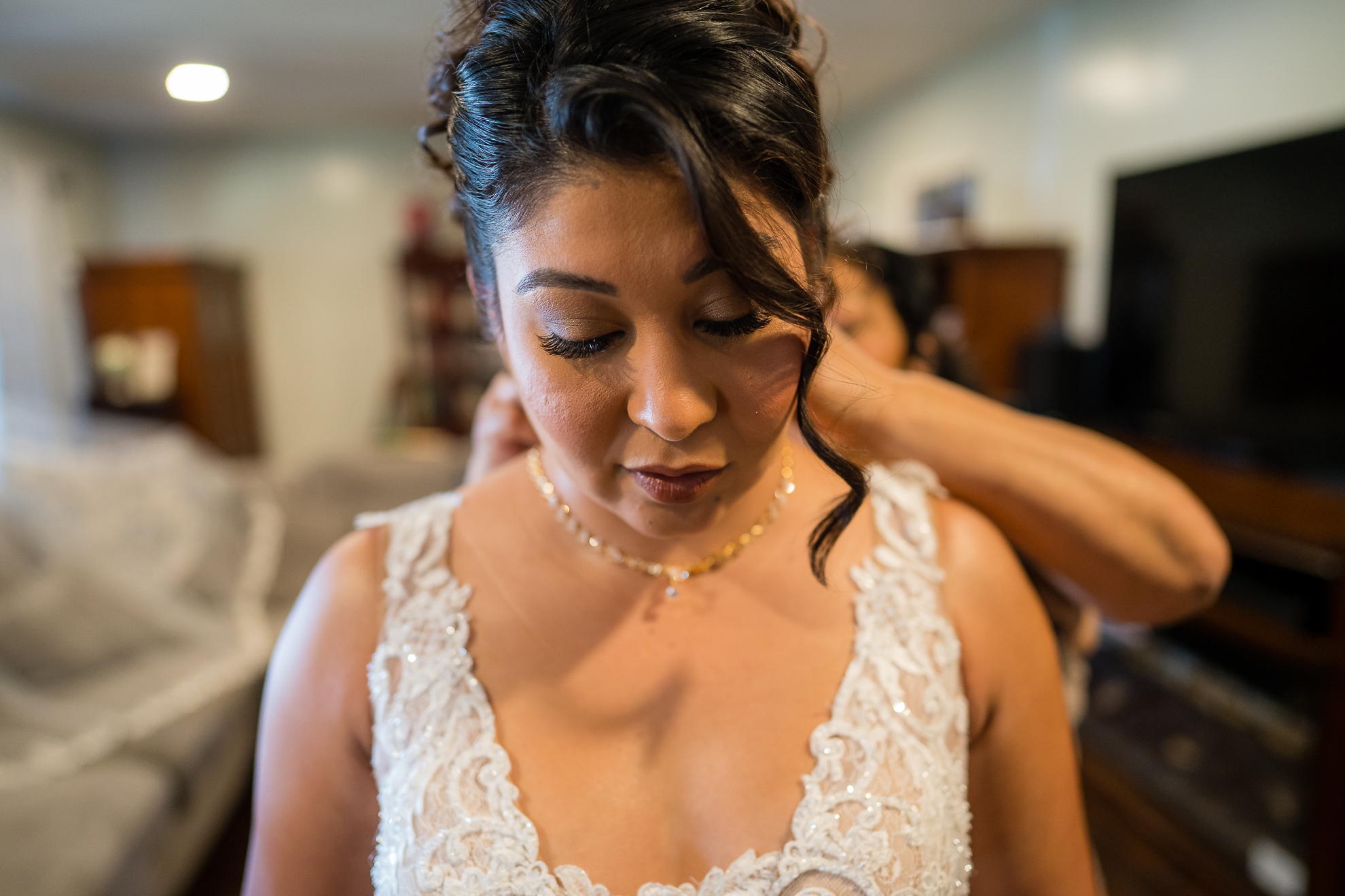 ThomasKim_photography A bride getting ready for her wedding in California, surrounded by love and anticipation.