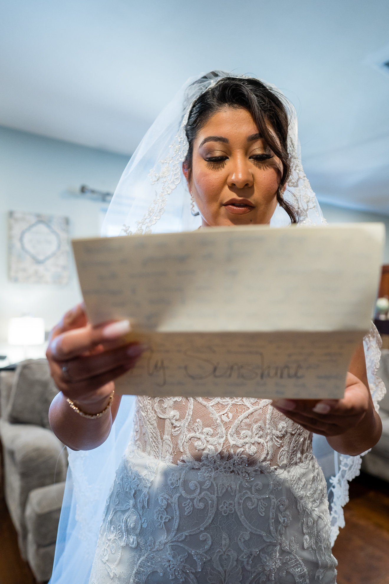 ThomasKim_photography Keywords used: S & A

Description: A bride reads a letter to her spouse.